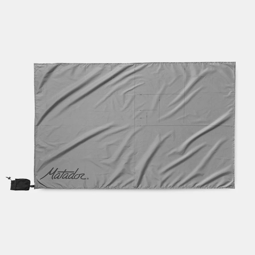 Schéma de pliage intégré à la Pocket Blanket Mini Matador